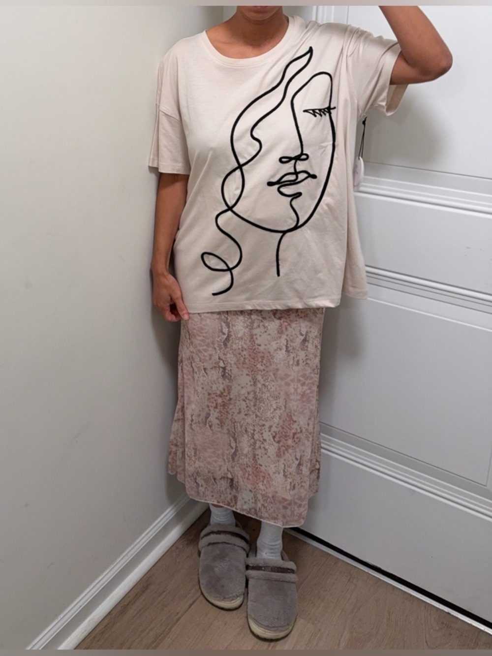 Cream Tee with Black Abstract Face Line Art